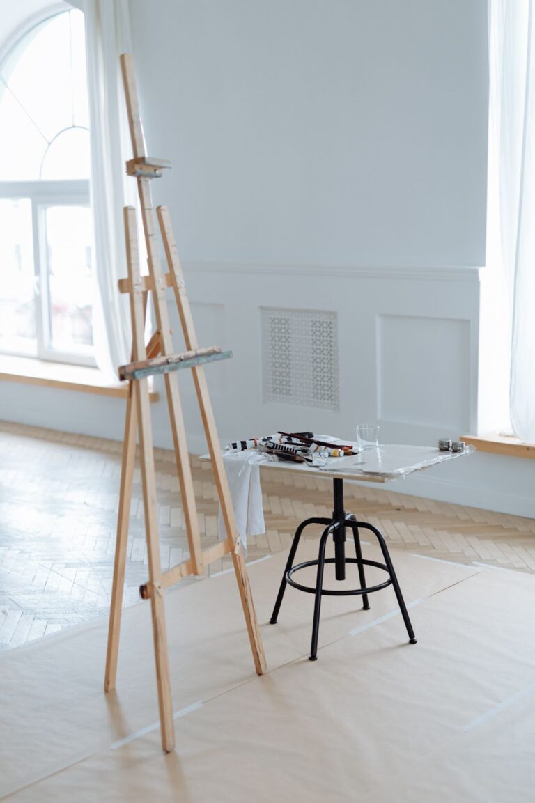 A wooden lyre easel in a bright studio